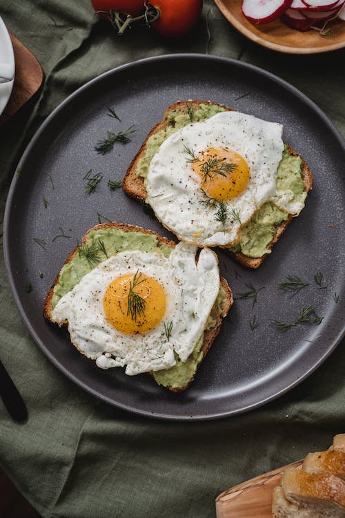 Quinoa Breakfast Bowl with Avocado and Eggs